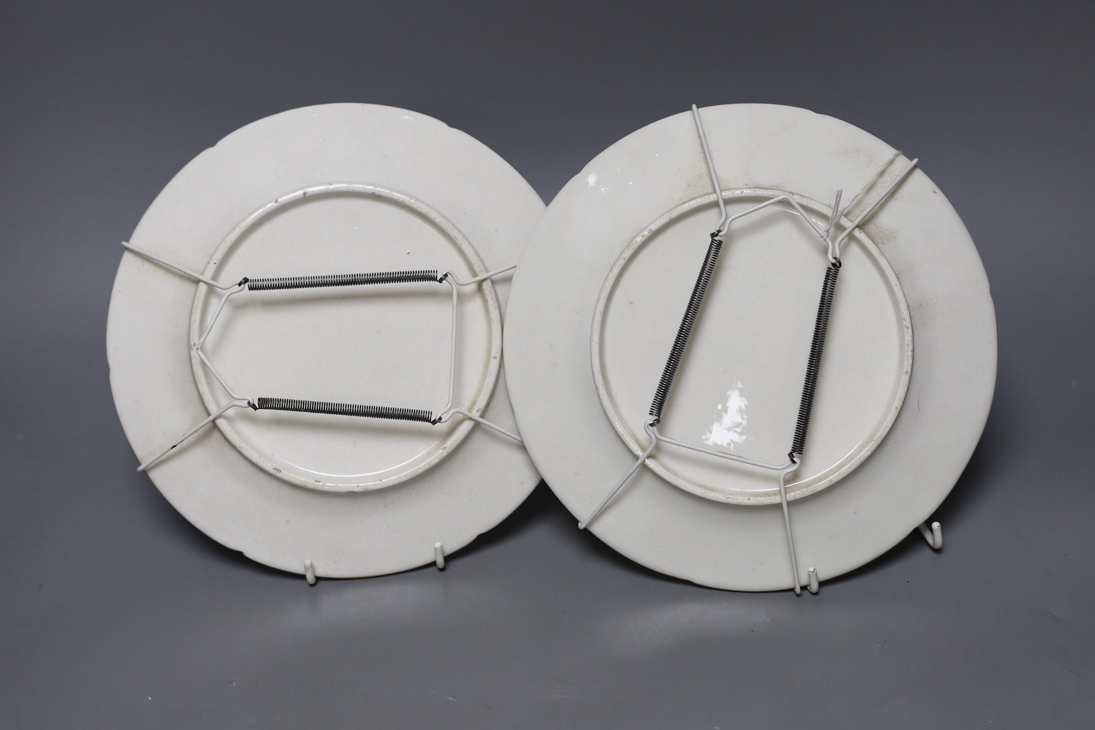 An stone china plate and a pair of Coalport floral plates, c.1815, Ironstone plate 22cms diameter